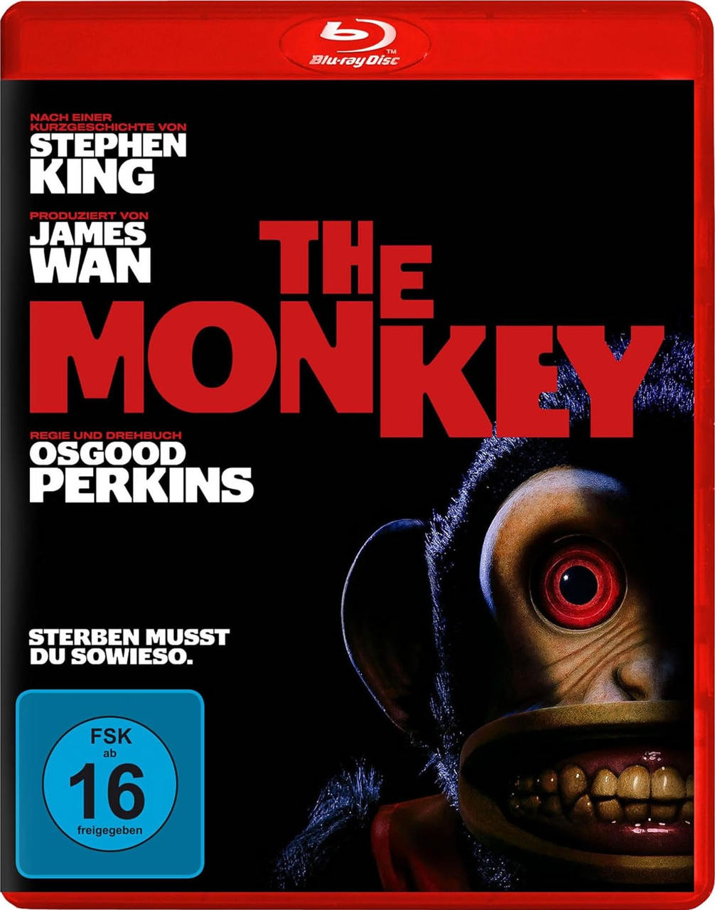 The Monkey Blu-ray-Cover. Ein gruseliges Affengesicht, dunkler Hintergrund, Text.