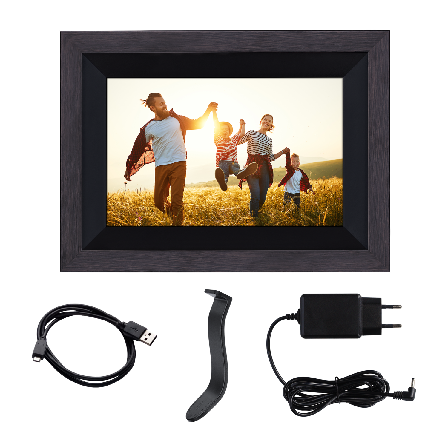 Digital photo frame. Picture of family in field. Accessories below: cable, adapter, and stand.