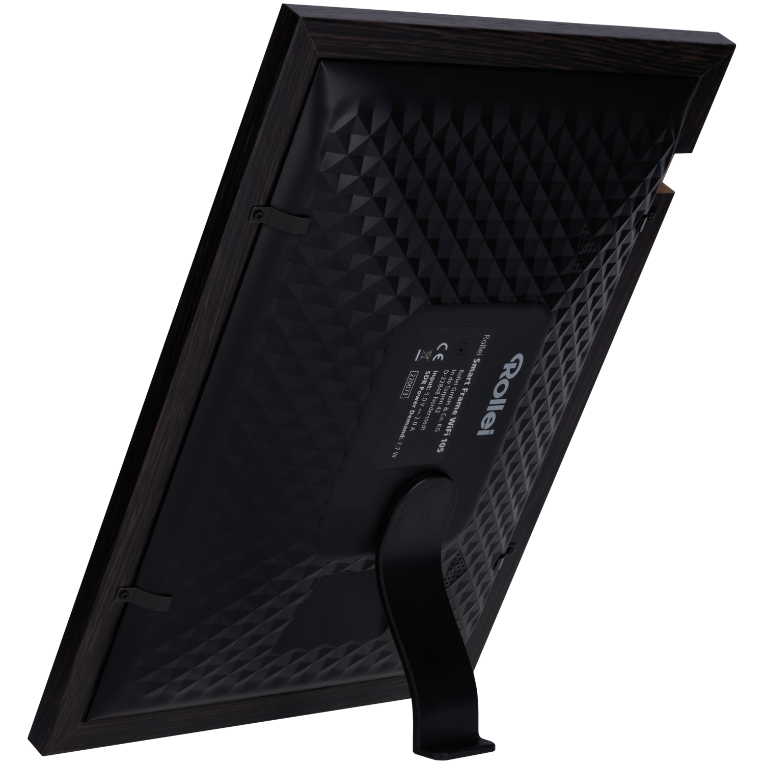 Back of a digital photo frame. Black frame, dark wood border. The back has a stand and a textured surface.