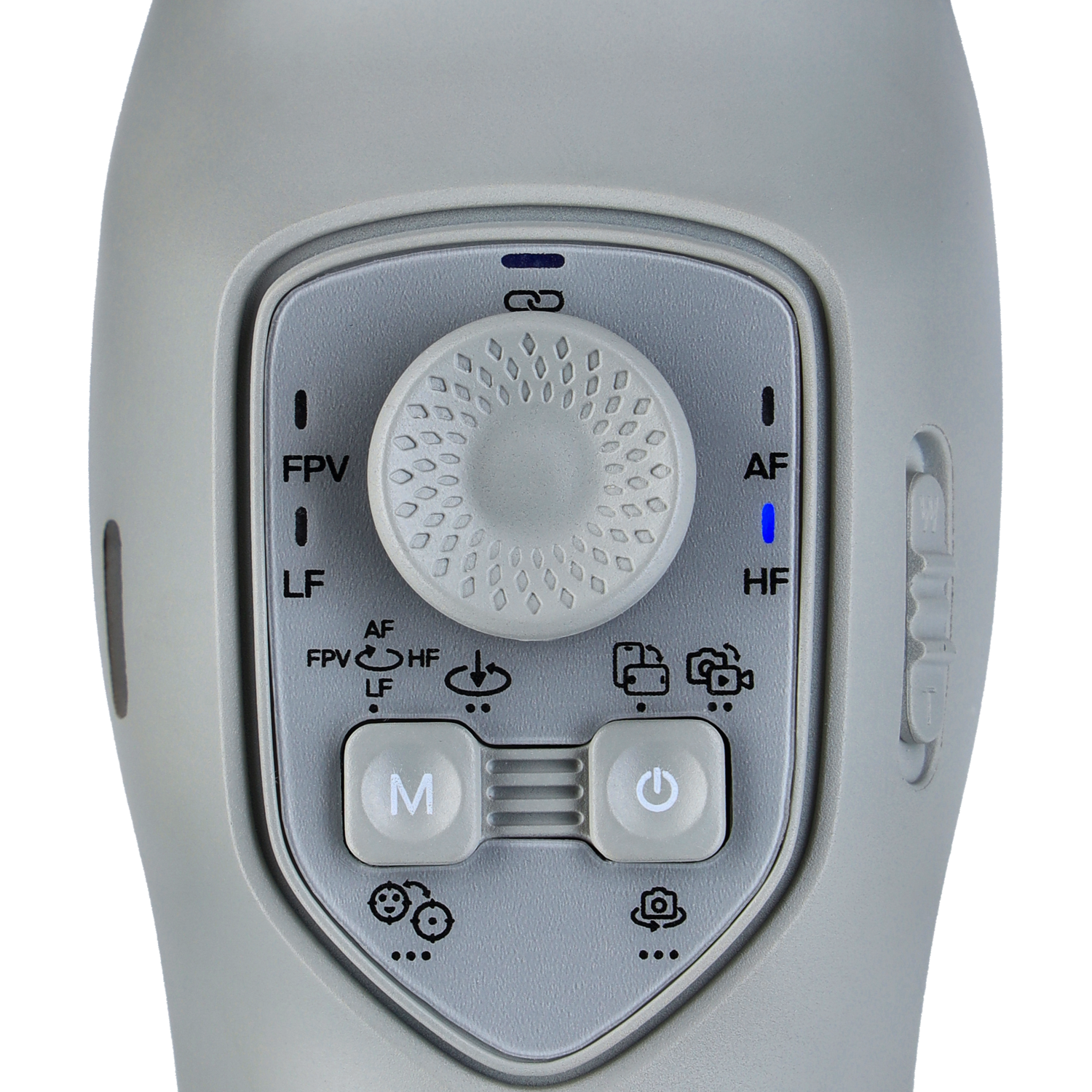 Close-up of a device control panel with a dial and buttons. Gray color.