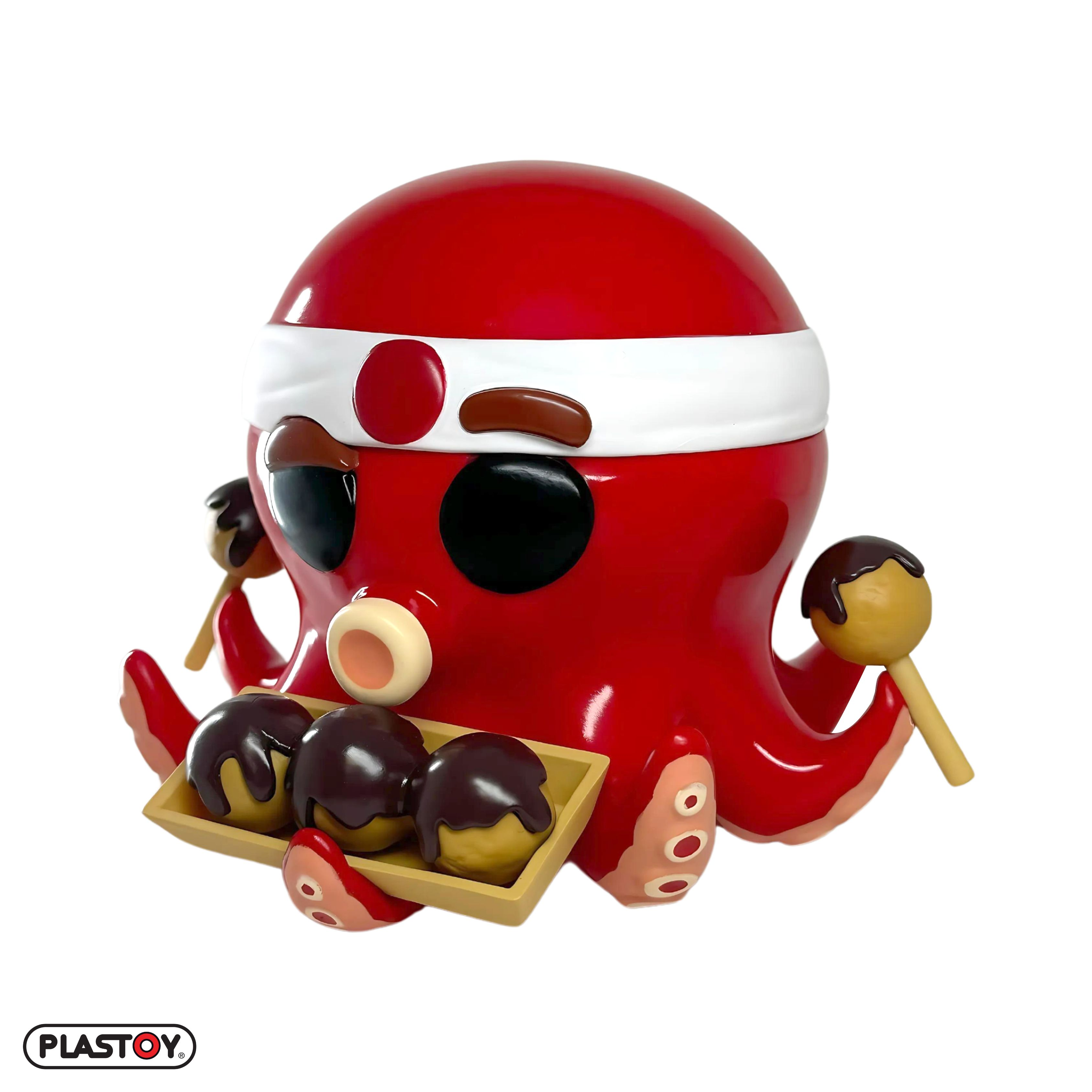 Rote Oktopus-Figur mit Takoyaki, weißem Stirnband, auf weißem Hintergrund.