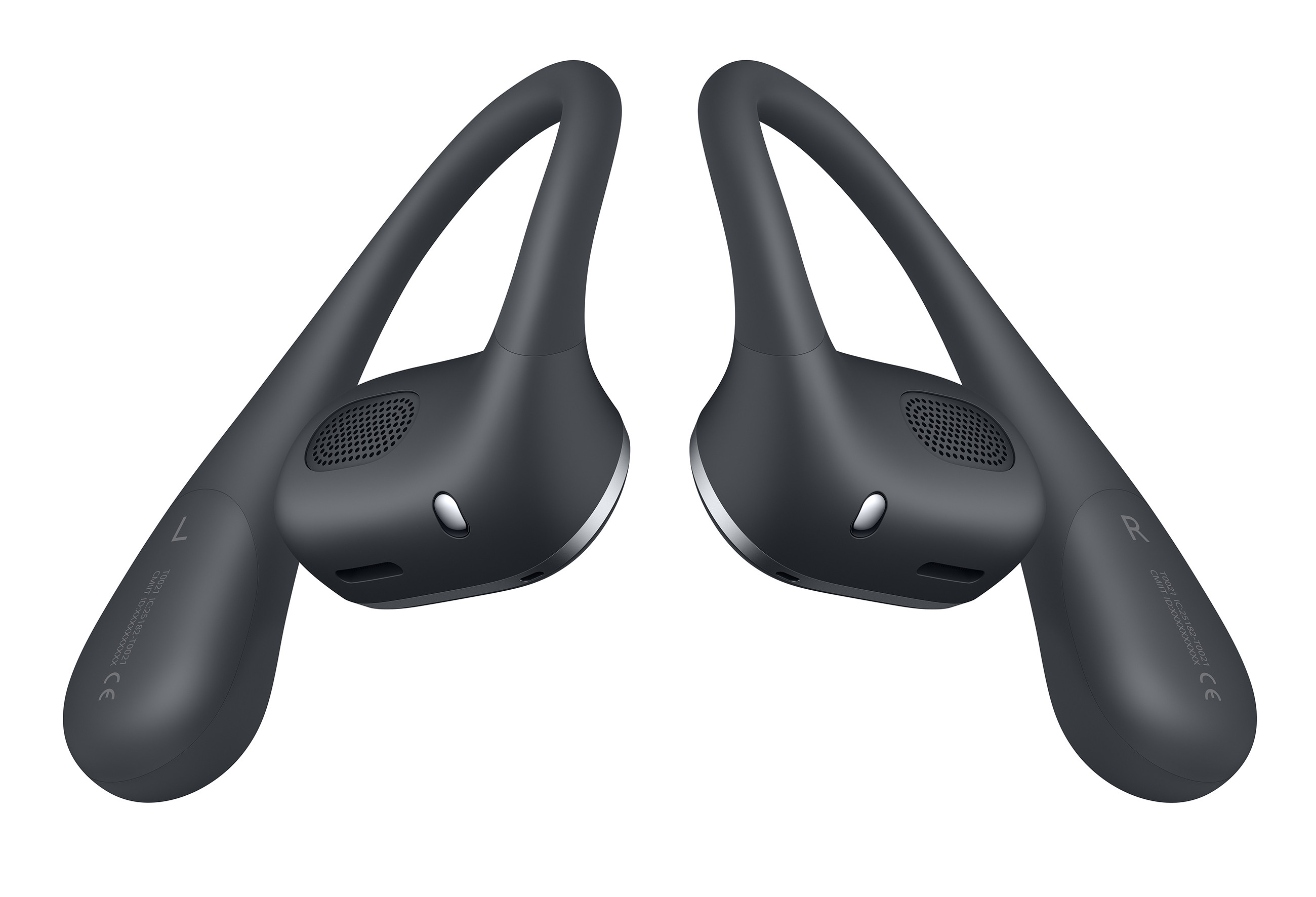 Para czarnych słuchawek nausznych, z białym tłem.