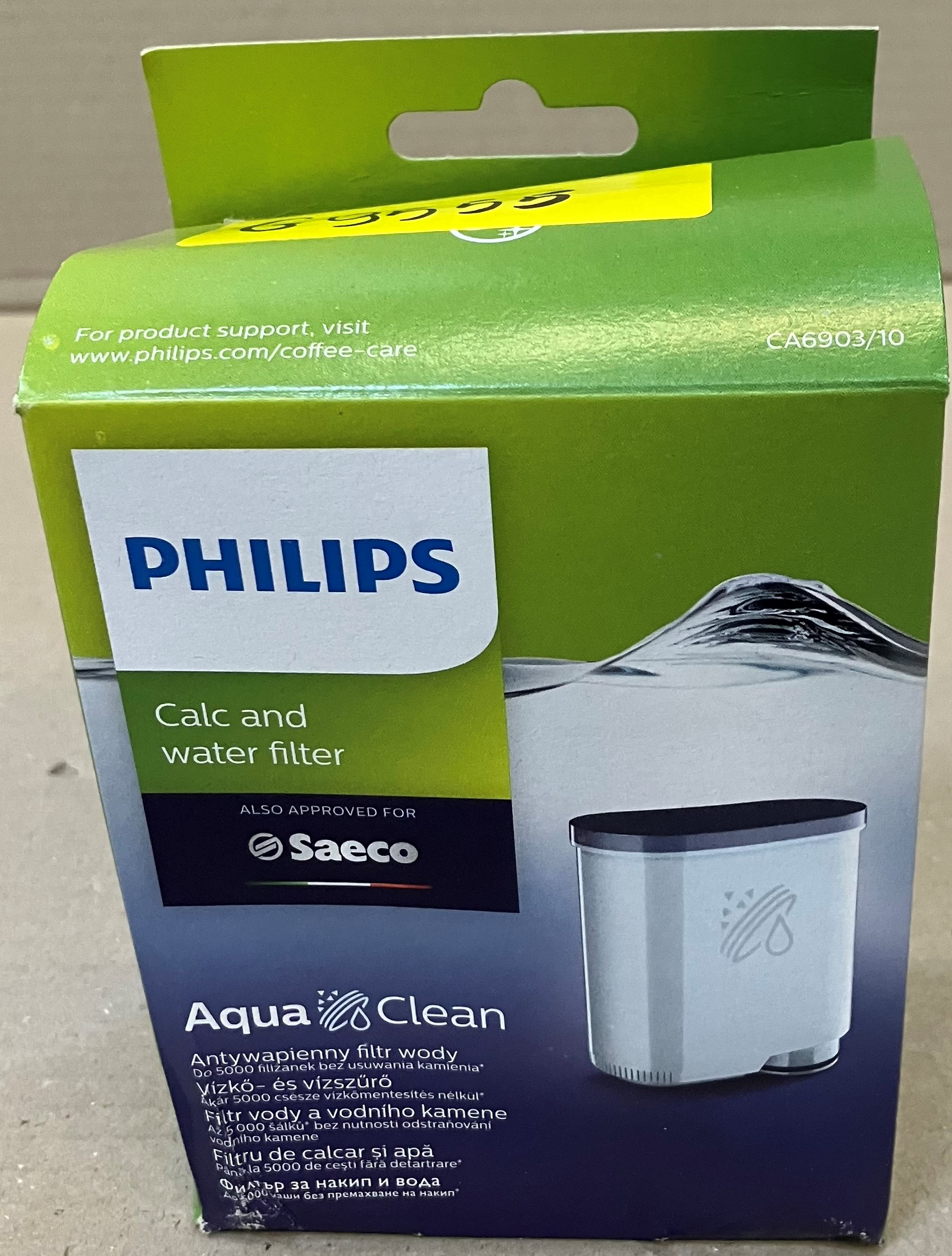 Zielono-białe pudełko filtra wody Philips AquaClean.