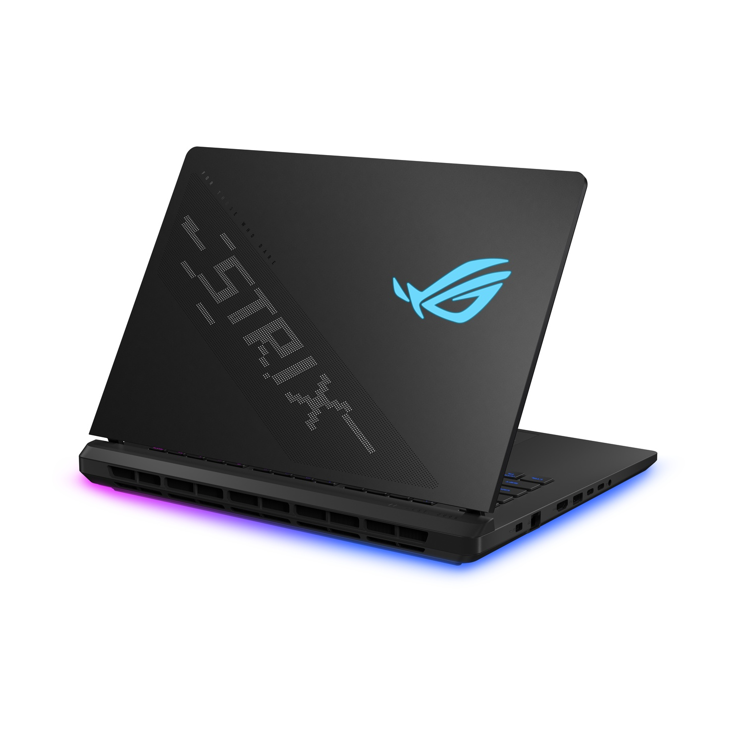 A black laptop with ROG Strix branding, open, angled away from the viewer.