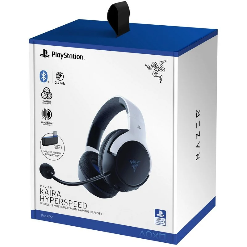 Auriculares para juegos, blancos y negros, en una caja. La caja tiene el nombre de la marca y detalles. Fondo blanco.