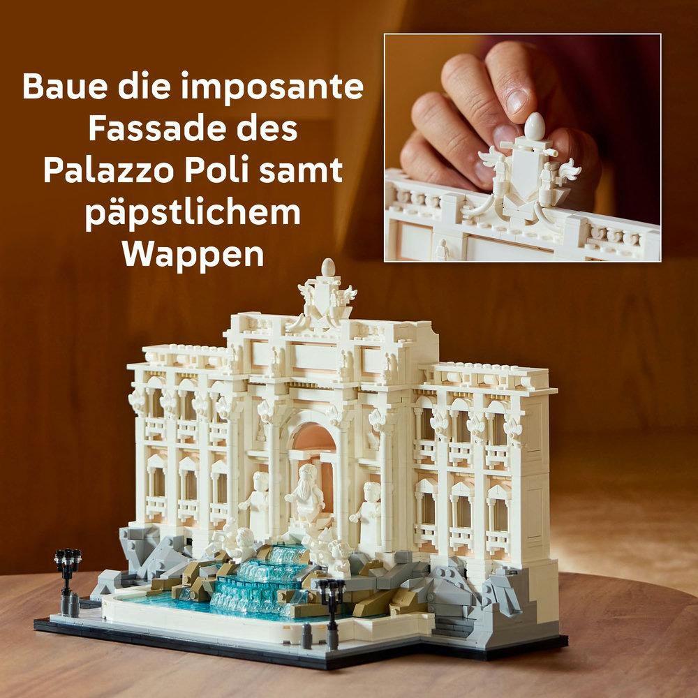 Lego-Modell des Trevi-Brunnens und eine Hand, die ein kleines Teil oben platziert.