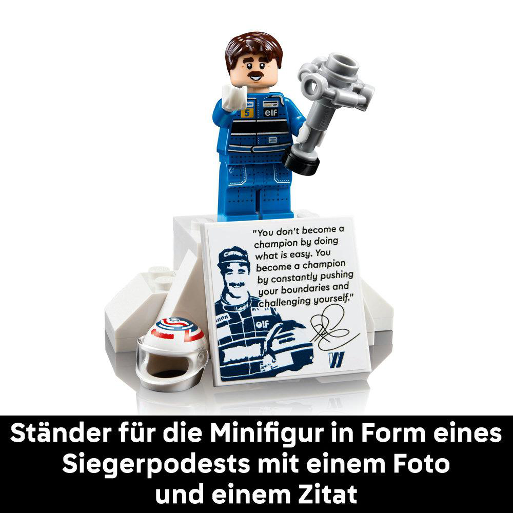 Lego-Minifigur auf einem Podium mit Foto und Zitat.