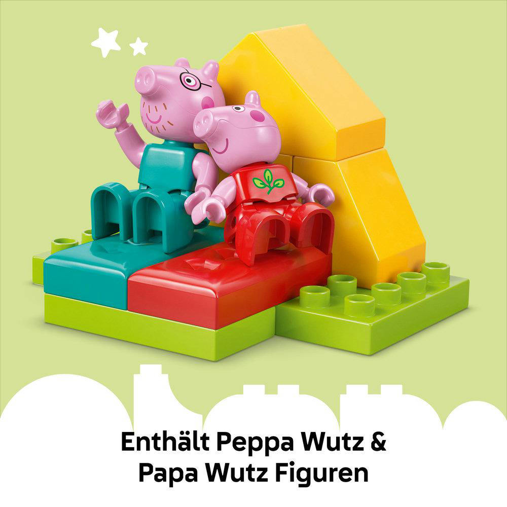 Lego-Figuren von Peppa und Papa Wutz auf Blöcken. Der Text lautet: 'Enthält Peppa Wutz & Papa Wutz'.