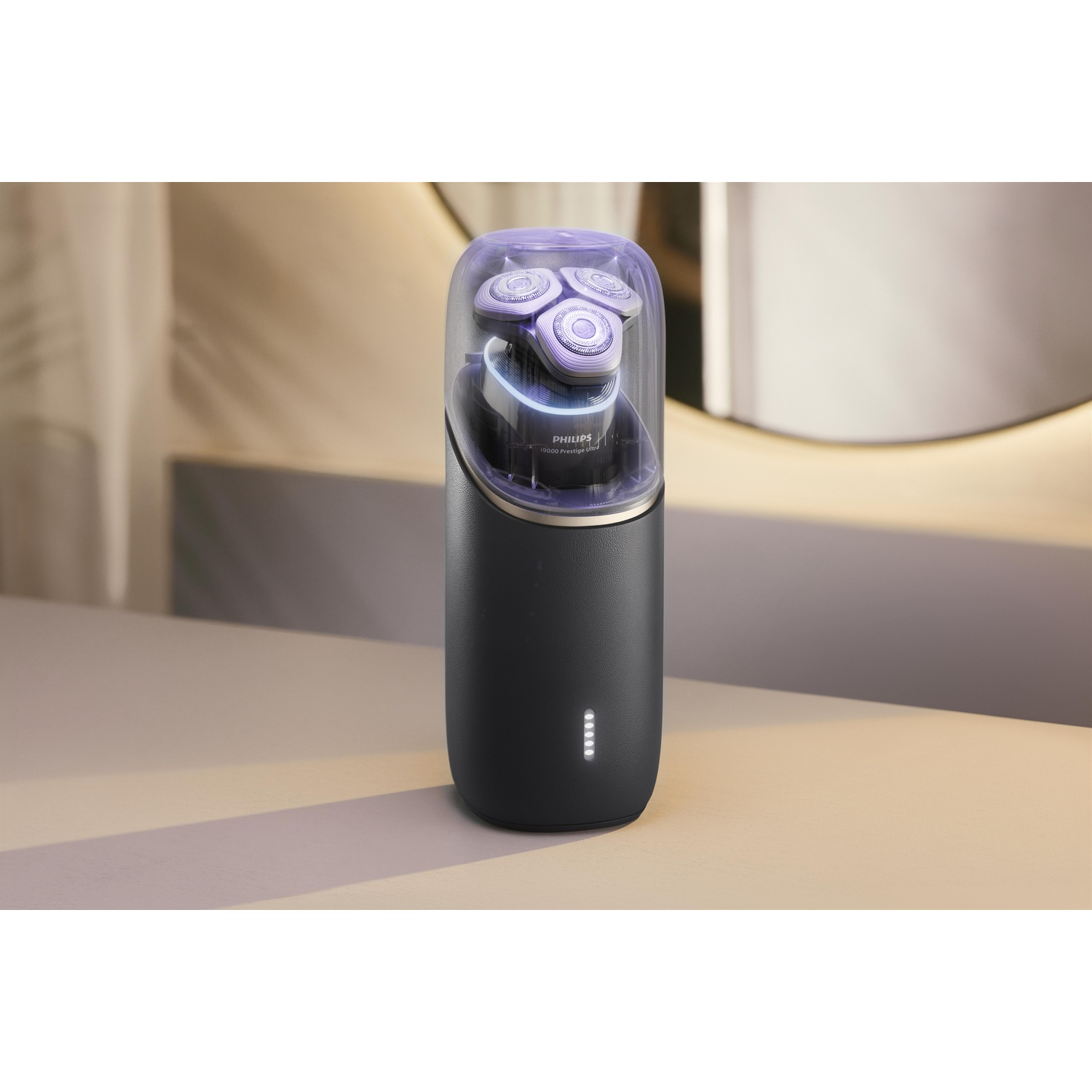 A black and purple shaver in a charging base. The shaver is in a clear case.