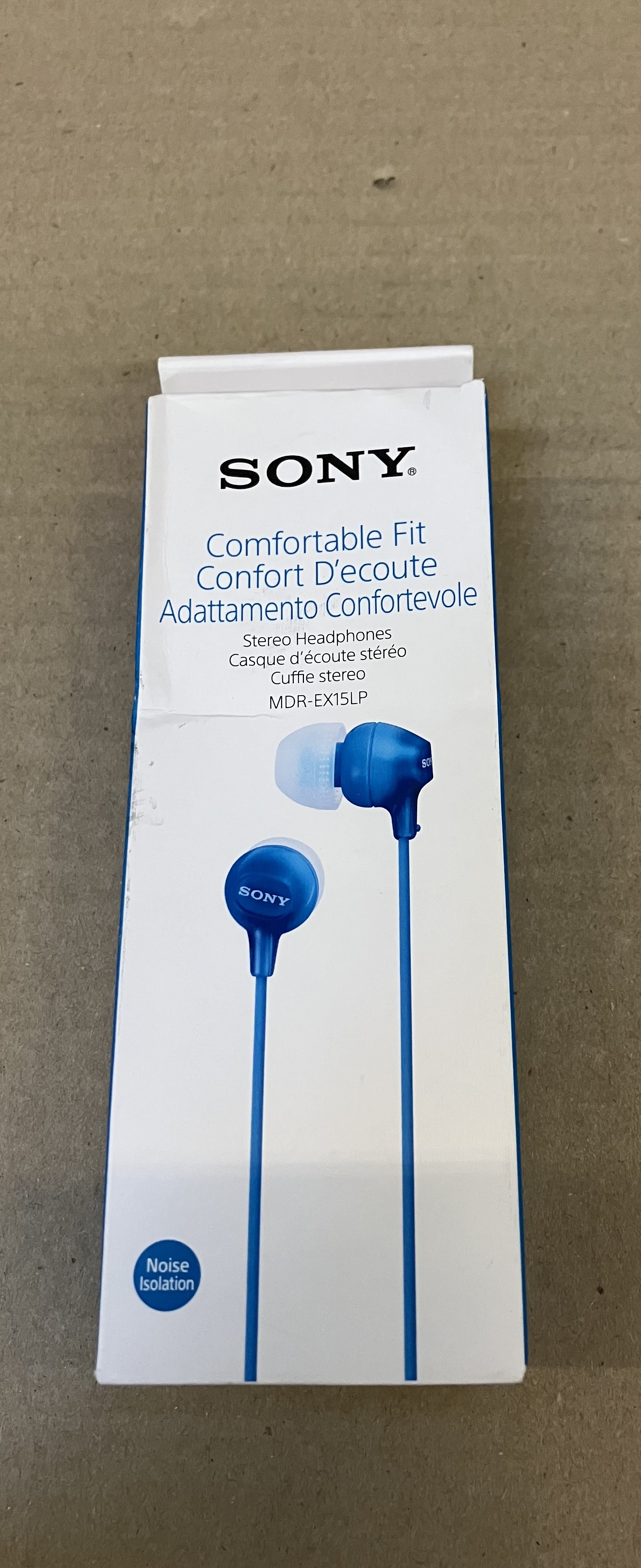 Biało-niebieskie pudełko słuchawek dousznych Sony.