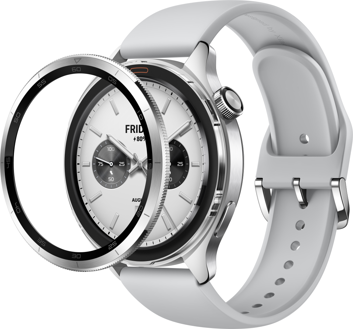 Srebrny smartwatch z białym paskiem i czarnym obracanym pierścieniem.