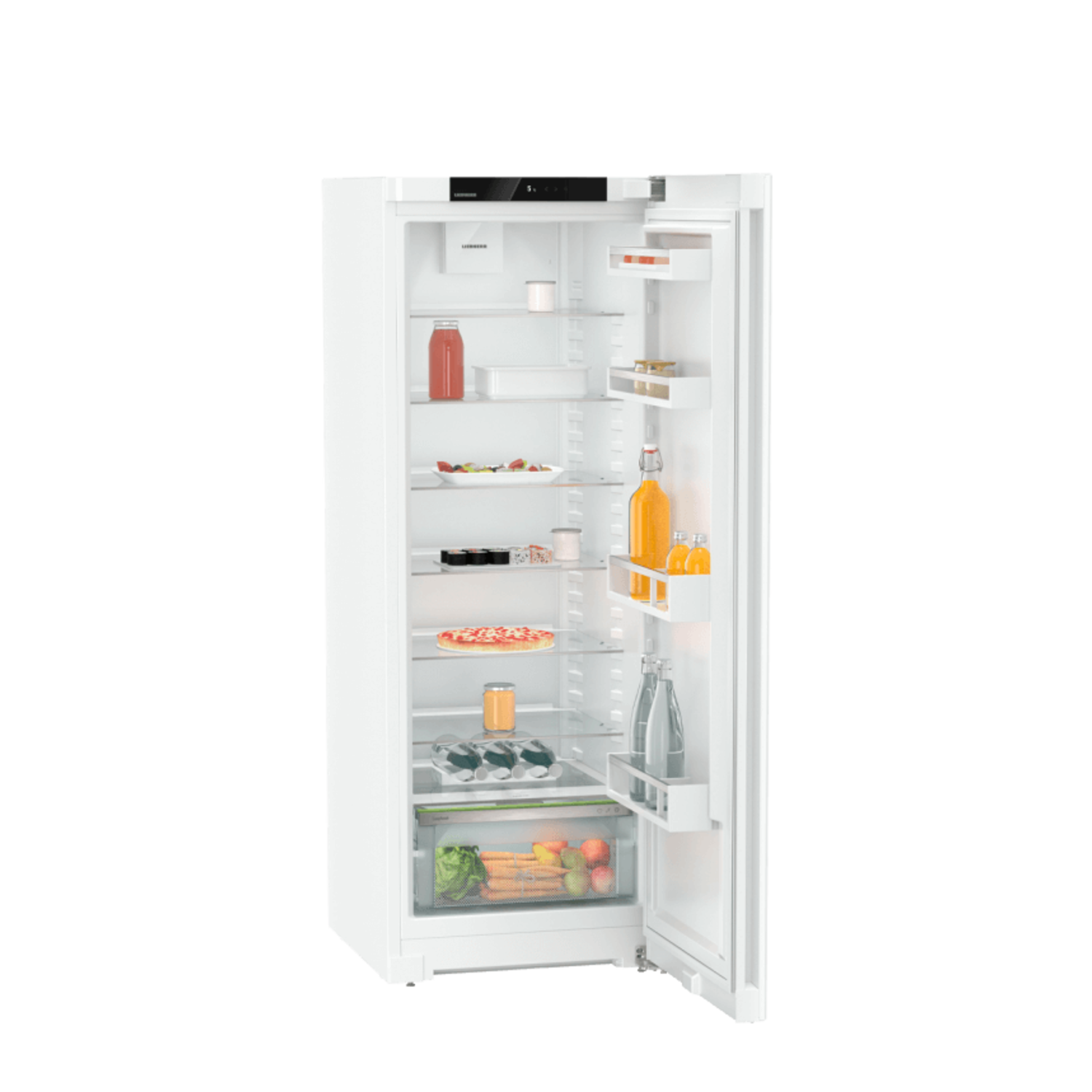An open white refrigerator, full of food items, on a black background.