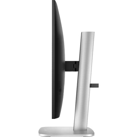 Vista lateral de un monitor con soporte plateado y pantalla negra. La pantalla es delgada y elegante.
