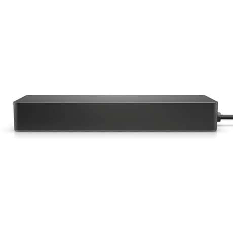 Un dispositivo rectangular gris oscuro, posiblemente un hub o estación de acoplamiento, sobre un fondo blanco.