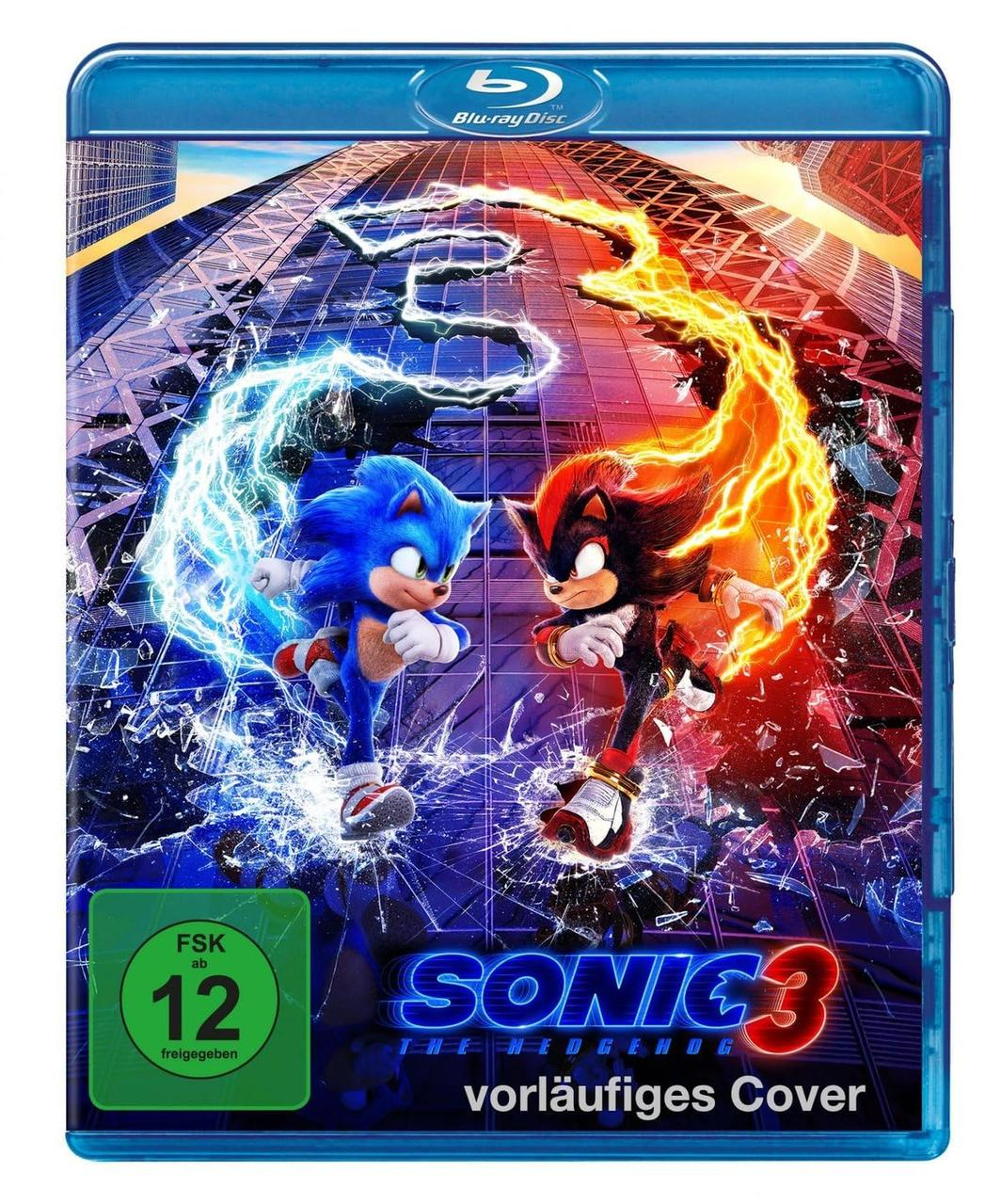 Ein Blu-ray-Disc-Cover mit Sonic und Shadow im Kampf. Die Disc ist in einem blauen Gehäuse mit Stadtbildhintergrund.