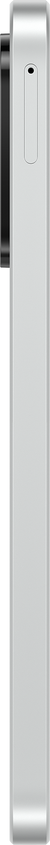 Un long objet rectangulaire blanc avec un élément noir sur le côté gauche, sur fond noir.