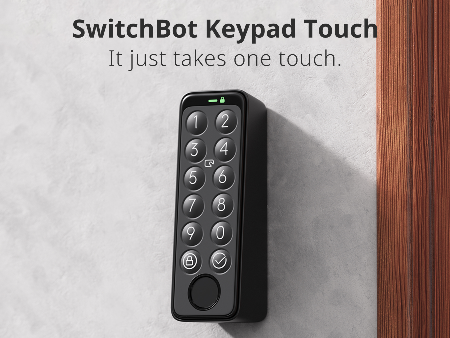Ein schwarzes SwitchBot-Tastaturfeld an einer Wand. Es hat nummerierte Tasten.