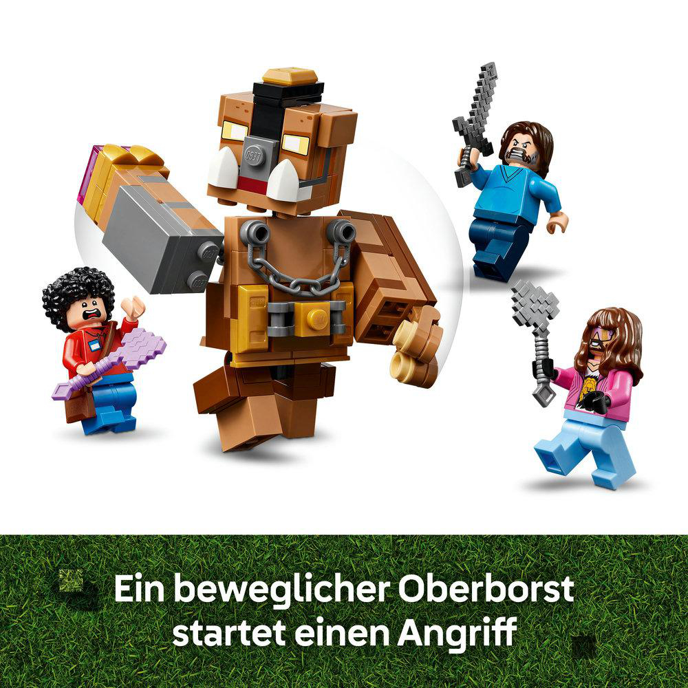 Lego Minecraft Figuren. Eine große braune Figur ist bereit anzugreifen, umgeben von anderen Figuren.
