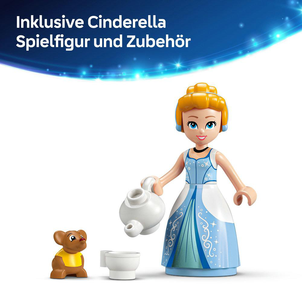 Eine Cinderella-Figur mit einem Bären und einer weißen Teekanne und einer weißen Toilette.