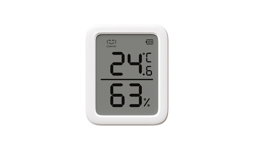 Weißes Digitalthermometer zeigt 24,6°C und 63% Luftfeuchtigkeit mit Komfort-Symbol.
