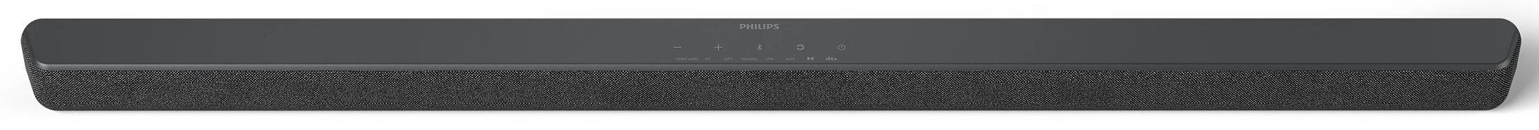 Ciemnoszary soundbar Philips z materiałową maskownicą głośnika. Posiada przyciski sterowania i logo Philips.