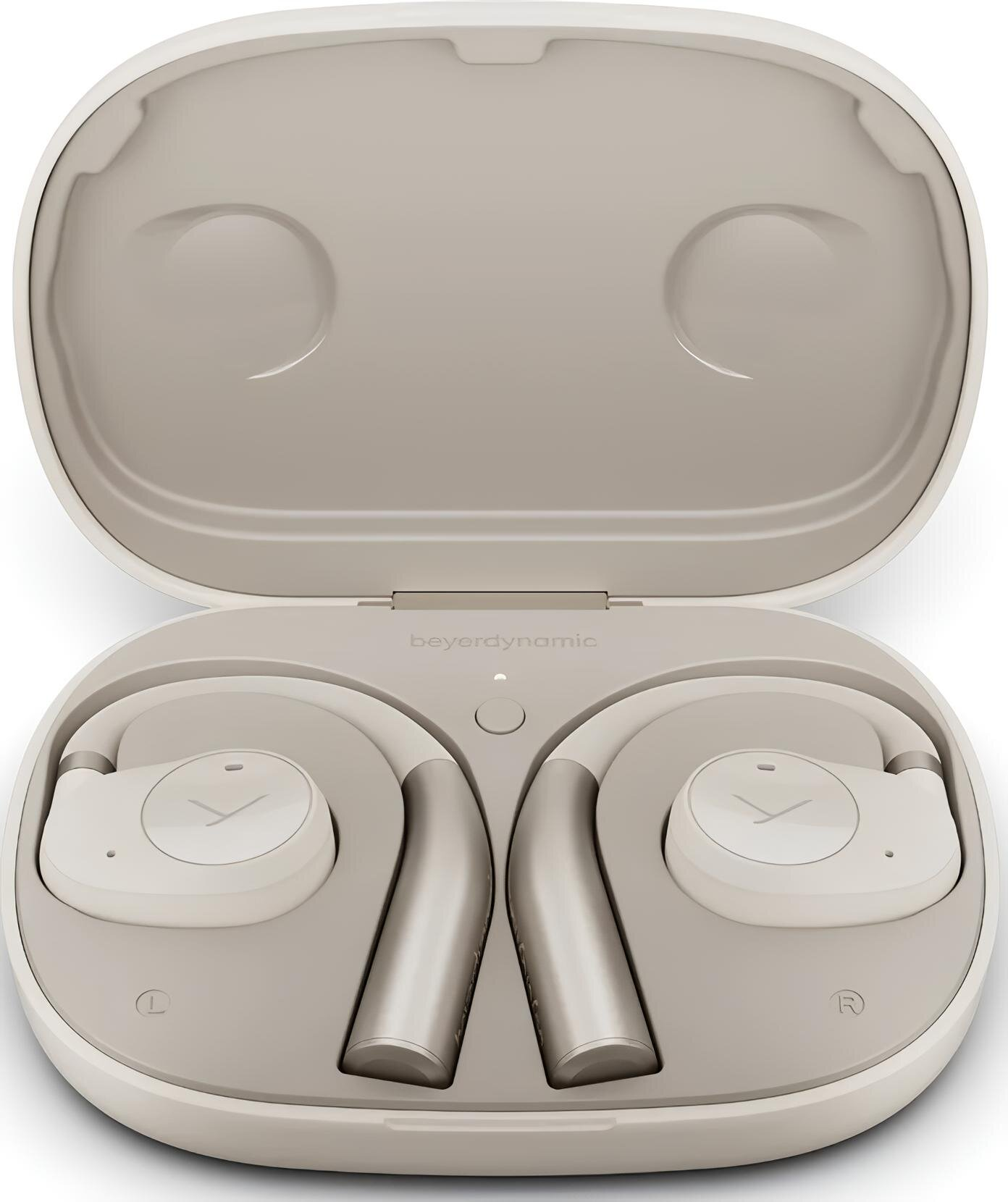 Otwarta biała obudowa słuchawek. W środku białe słuchawki ze srebrnym akcentem.