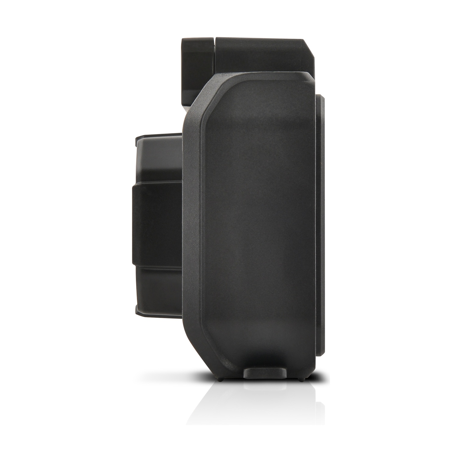 Un altoparlante o dispositivo audio nero, rettangolare, con vista laterale, forse uno smart speaker, su una superficie bianca.