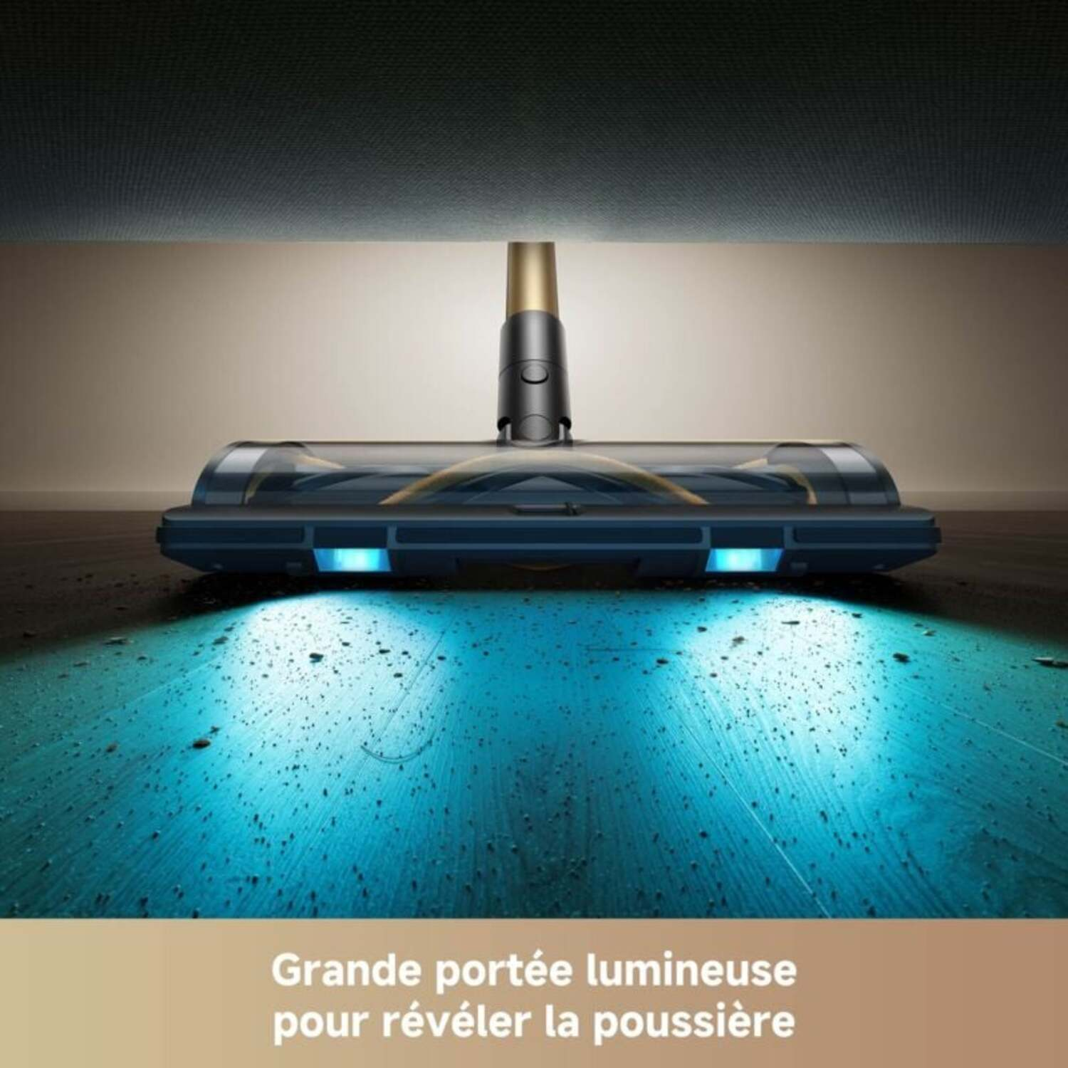 Une tête d'aspirateur avec des lumières bleues éclairant le sol. La tête est noire et or.