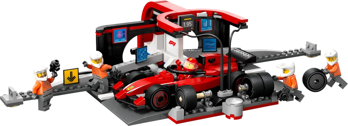 Zestaw Lego z czerwonym samochodem wyścigowym Ferrari w boksie.