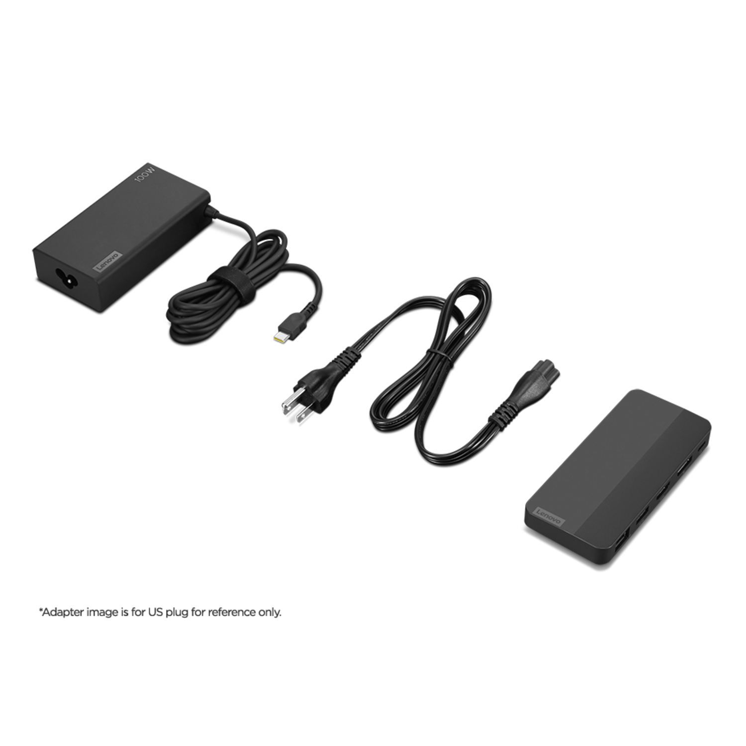 Lenovo voedingsadapter en andere accessoires met kabels. Zwarte en grijze apparaten.