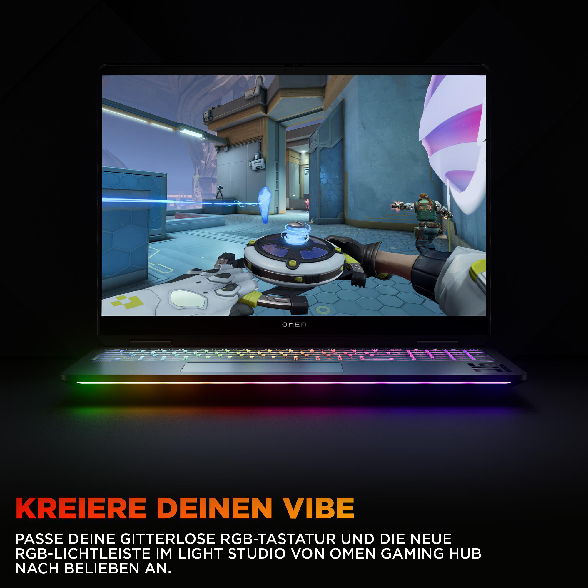Laptop mit Videospielanzeige und regenbogenfarbener Tastaturbeleuchtung.