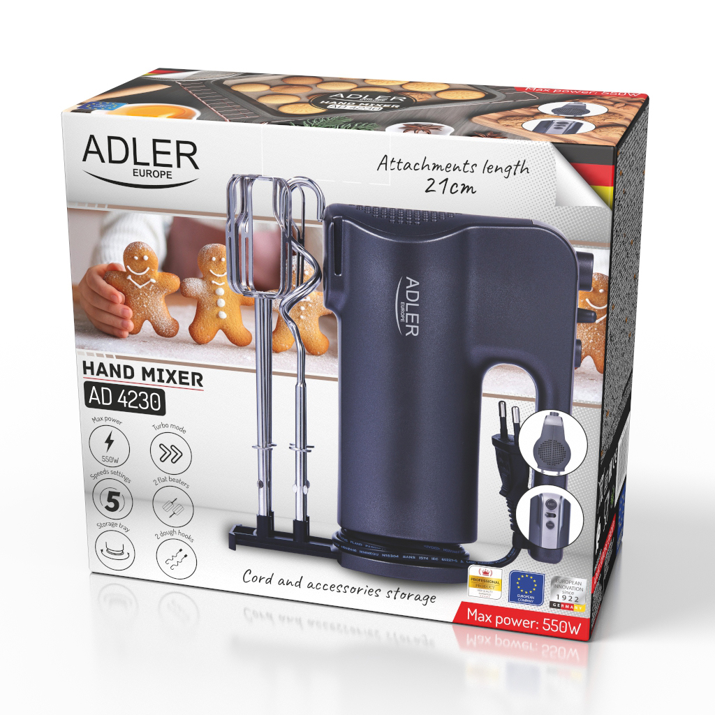 Adler kézi mixer doboz. Fekete mixer és tartozékok láthatók. A háttérben mézeskalács emberek.