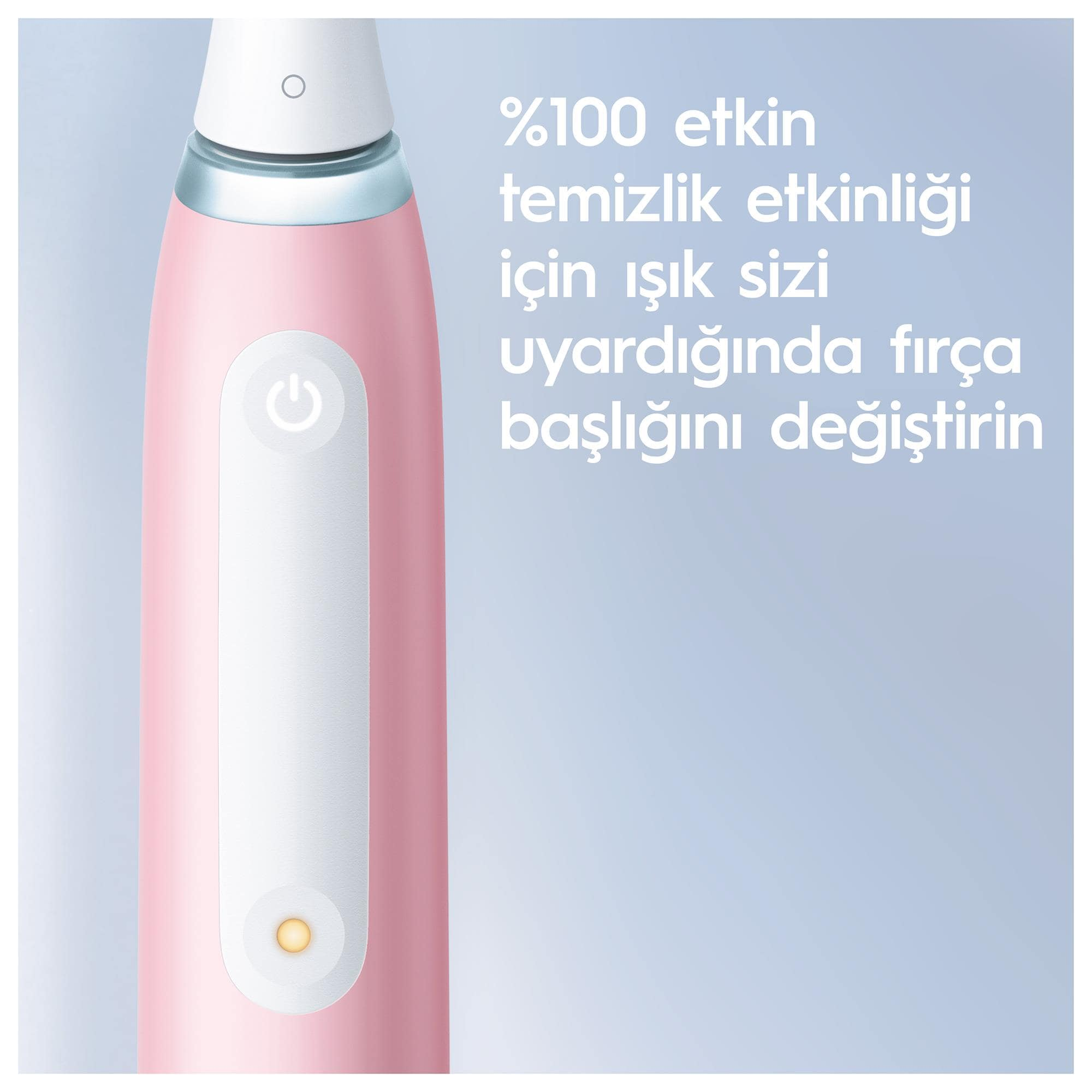 Pembe bir elektrikli diş fırçasının yakın çekimi, fırça başlığı değişimi hatırlatıcıları içeren Türkçe metinle.