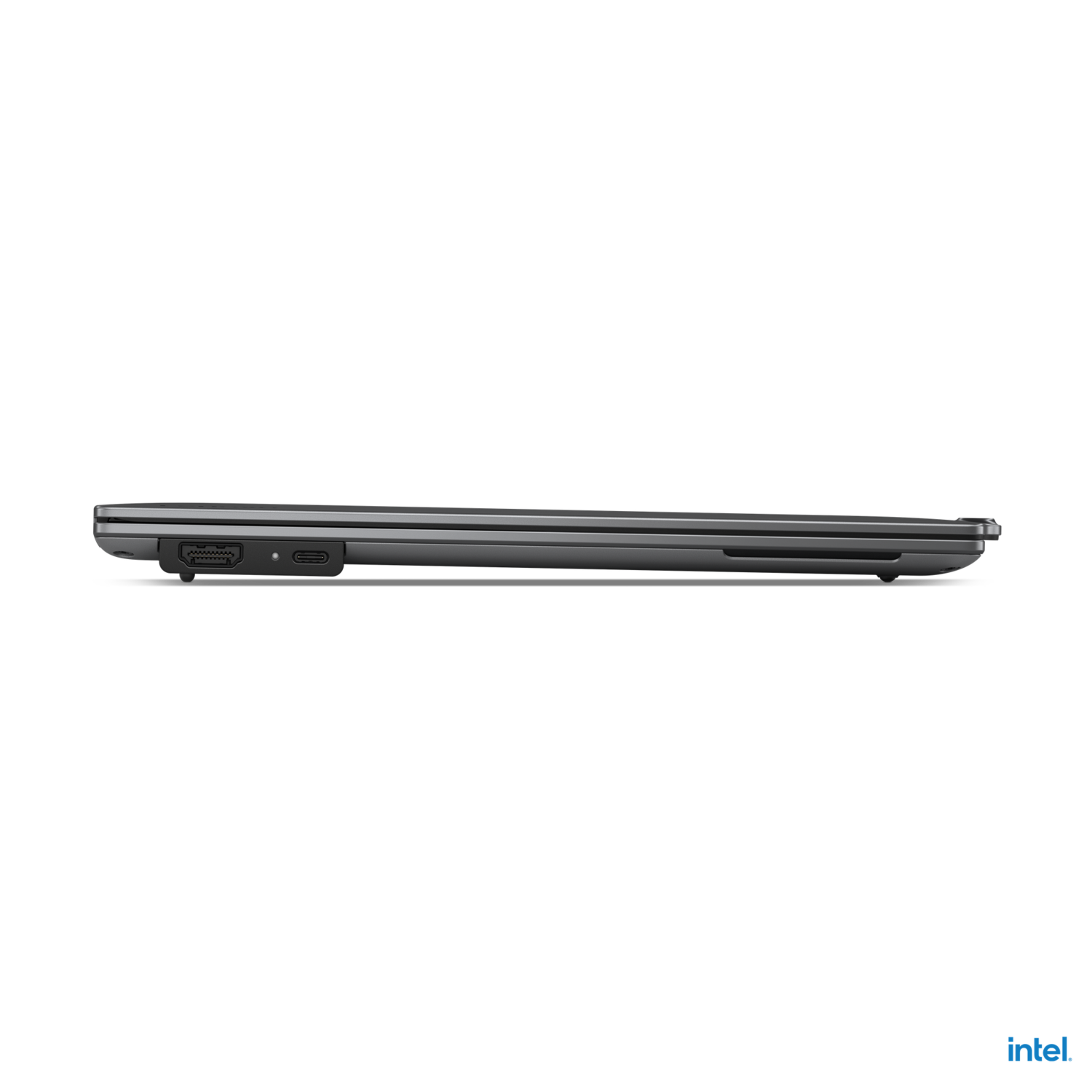 Laptop side view, silver color, Intel logo at the bottom. Black background. Closed, showing ports and edge.