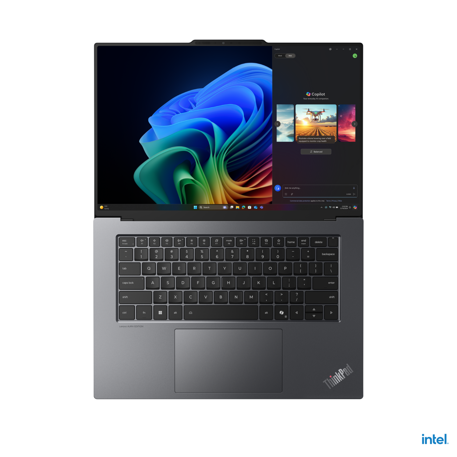 Black laptop with a screen displaying a user interface. Black background.