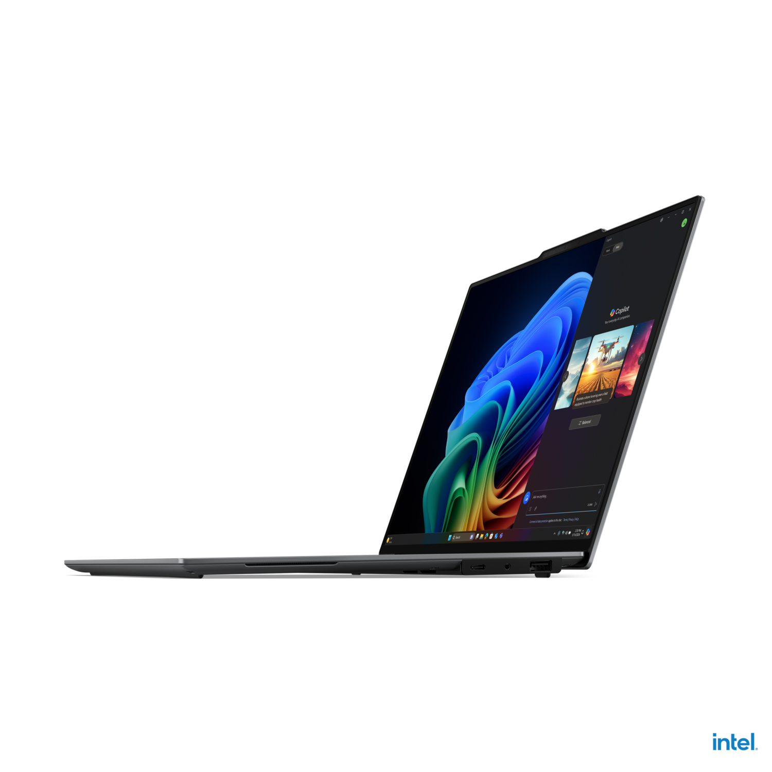 A laptop is open, displaying a colorful screen. The background is black. The Intel logo is on the bottom.