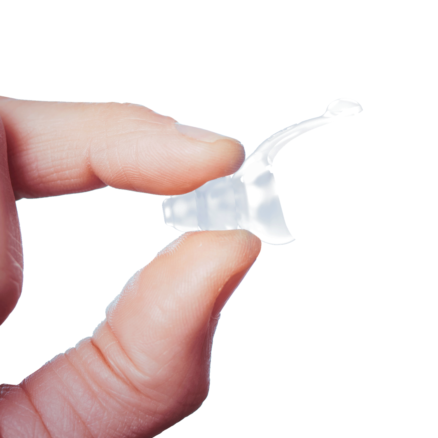A hand holding a translucent earplug.