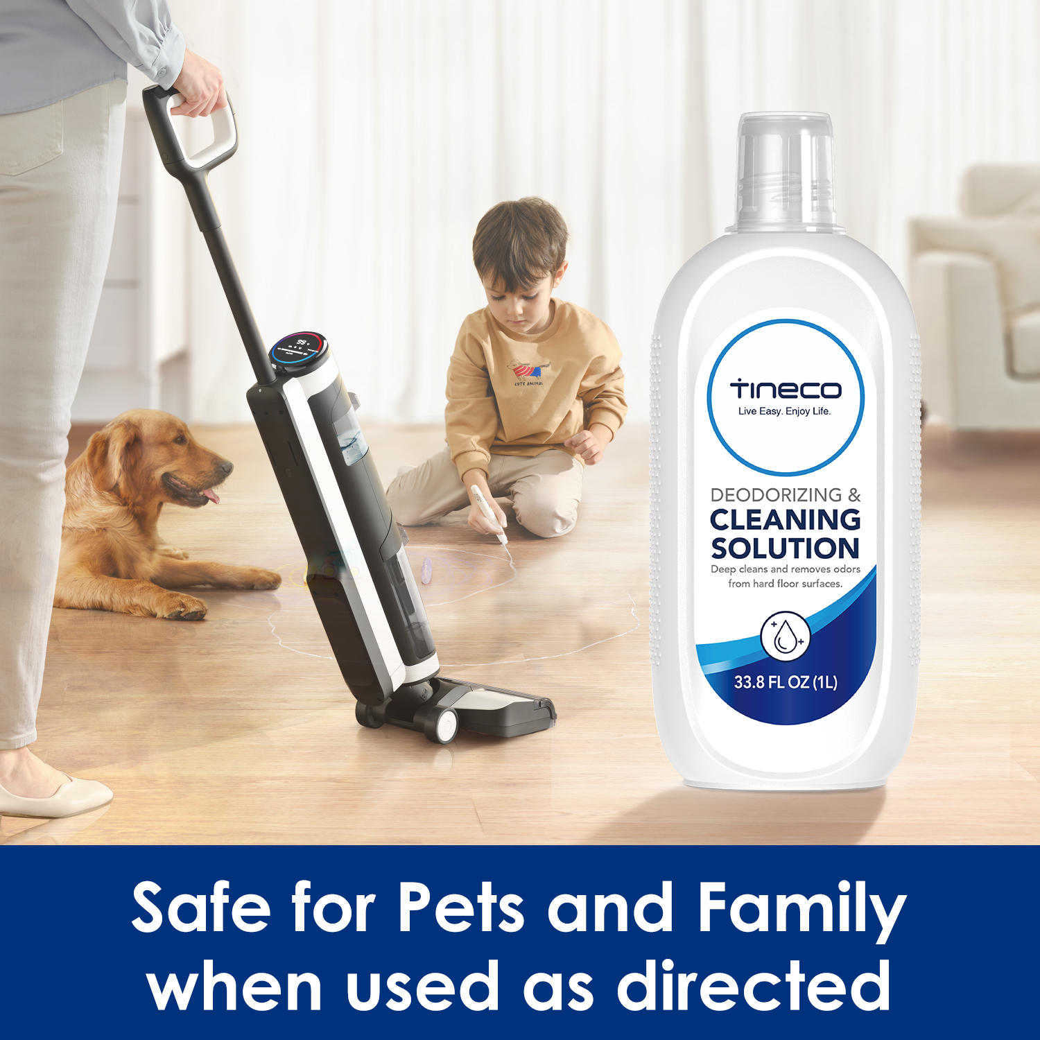 A vacuum cleaner, a cleaning solution bottle, a boy, a dog on wooden floor.