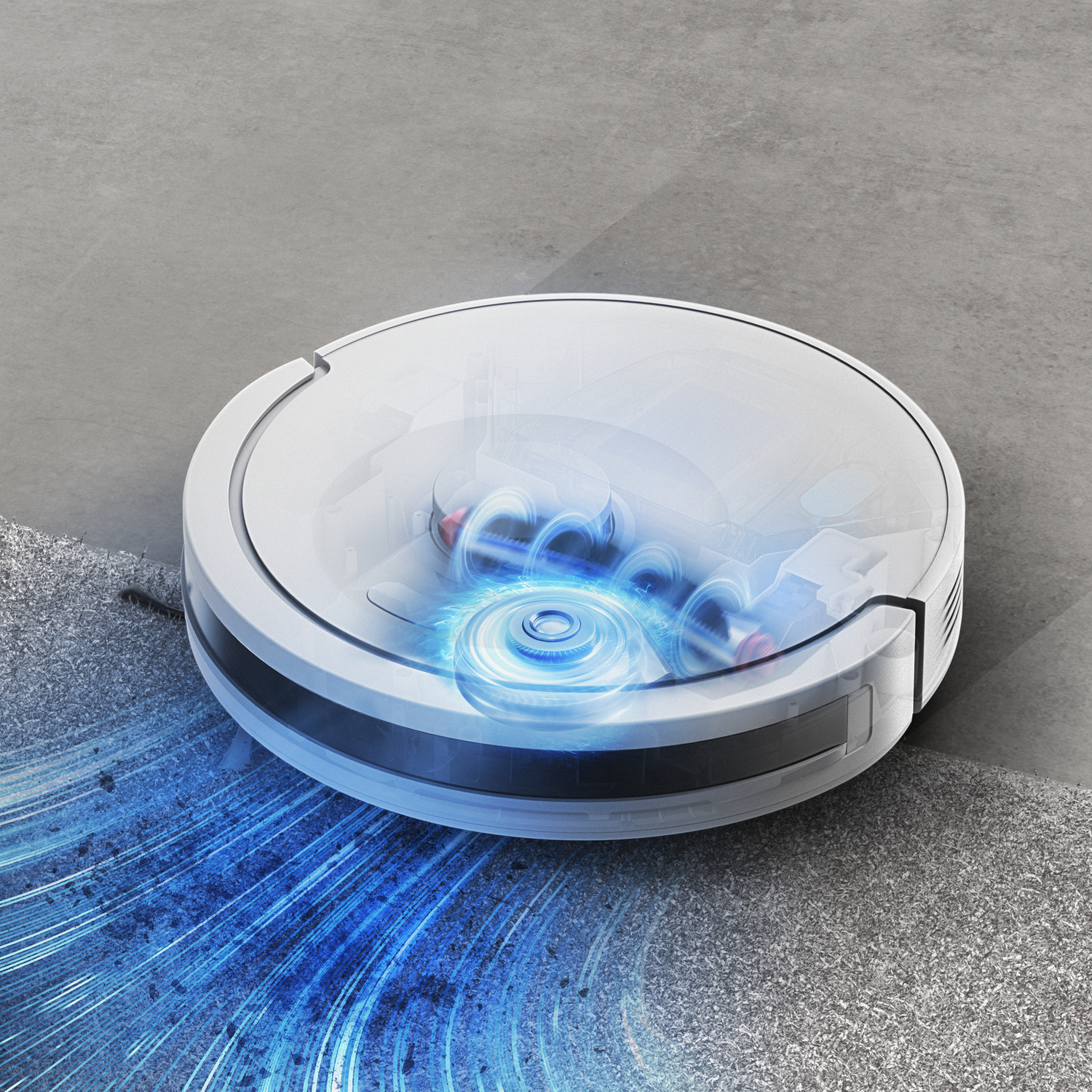A white robot vacuum cleaner on a gray floor. The inside is visible.