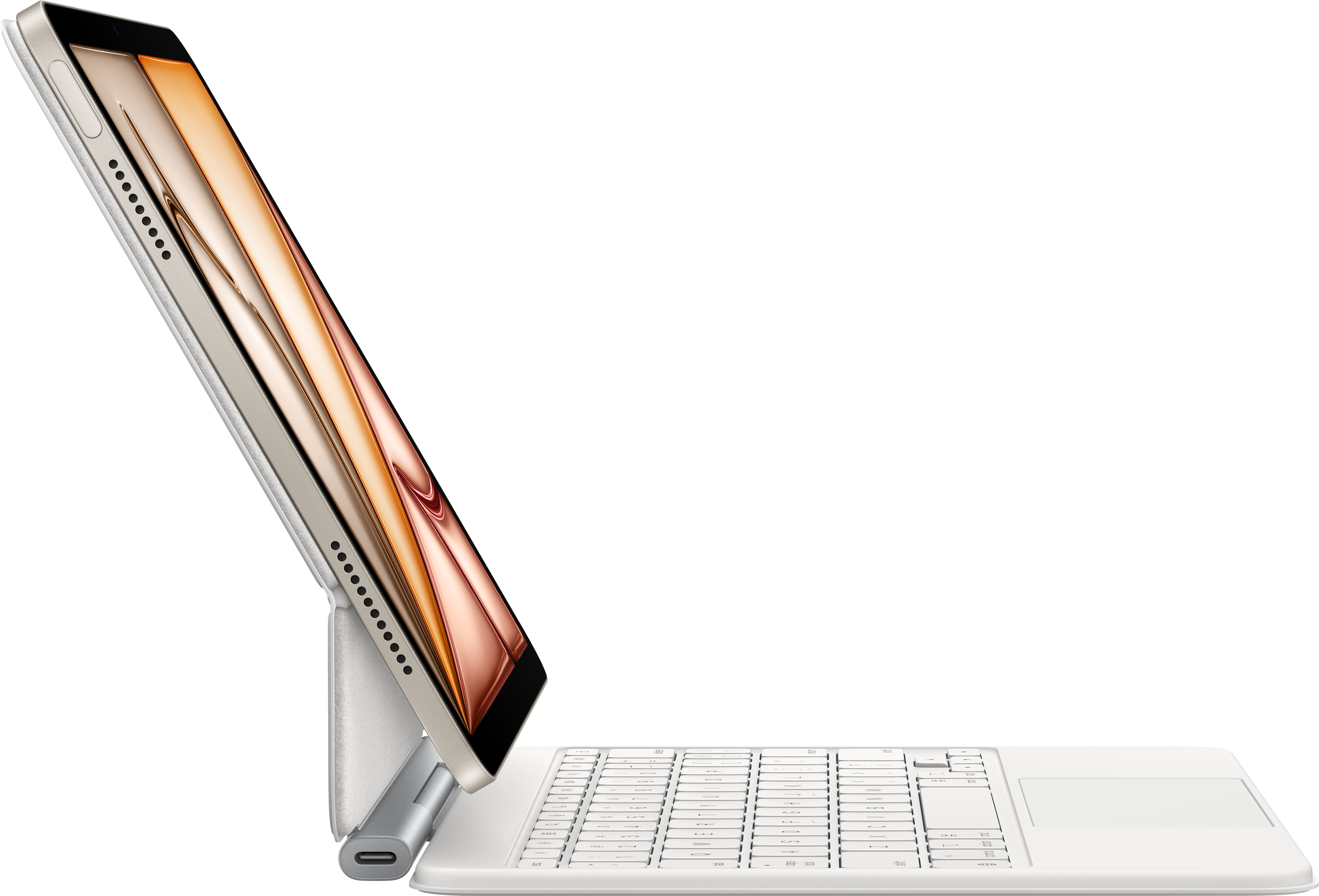 Tablet bianco con tastiera collegata. Lo schermo mostra un'immagine dai toni caldi.