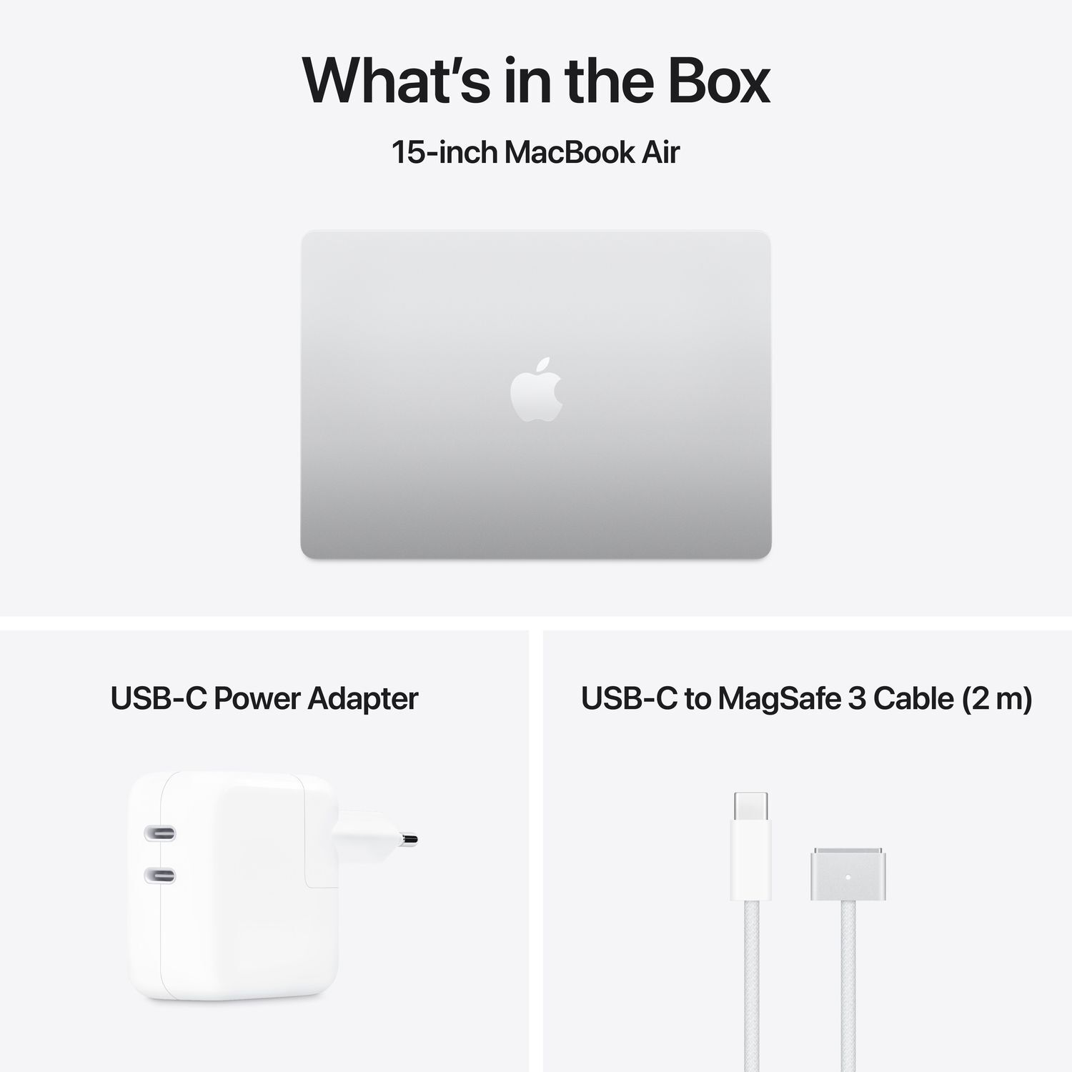 MacBook Air, voedingsadapter en kabel op wit.