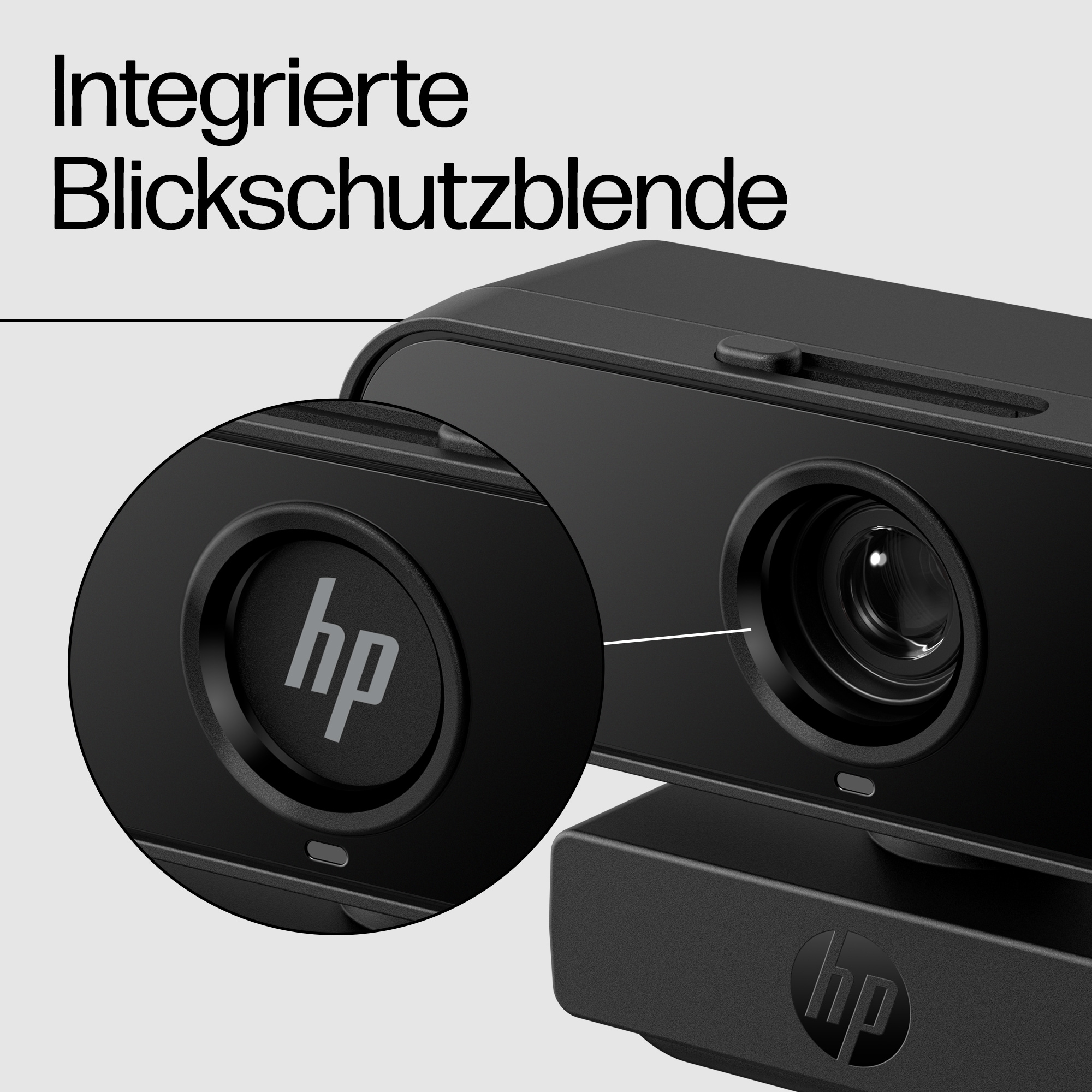 Nahaufnahme der schwarzen Webcam-Linse mit HP-Logo, zeigt integrierten Sichtschutz.