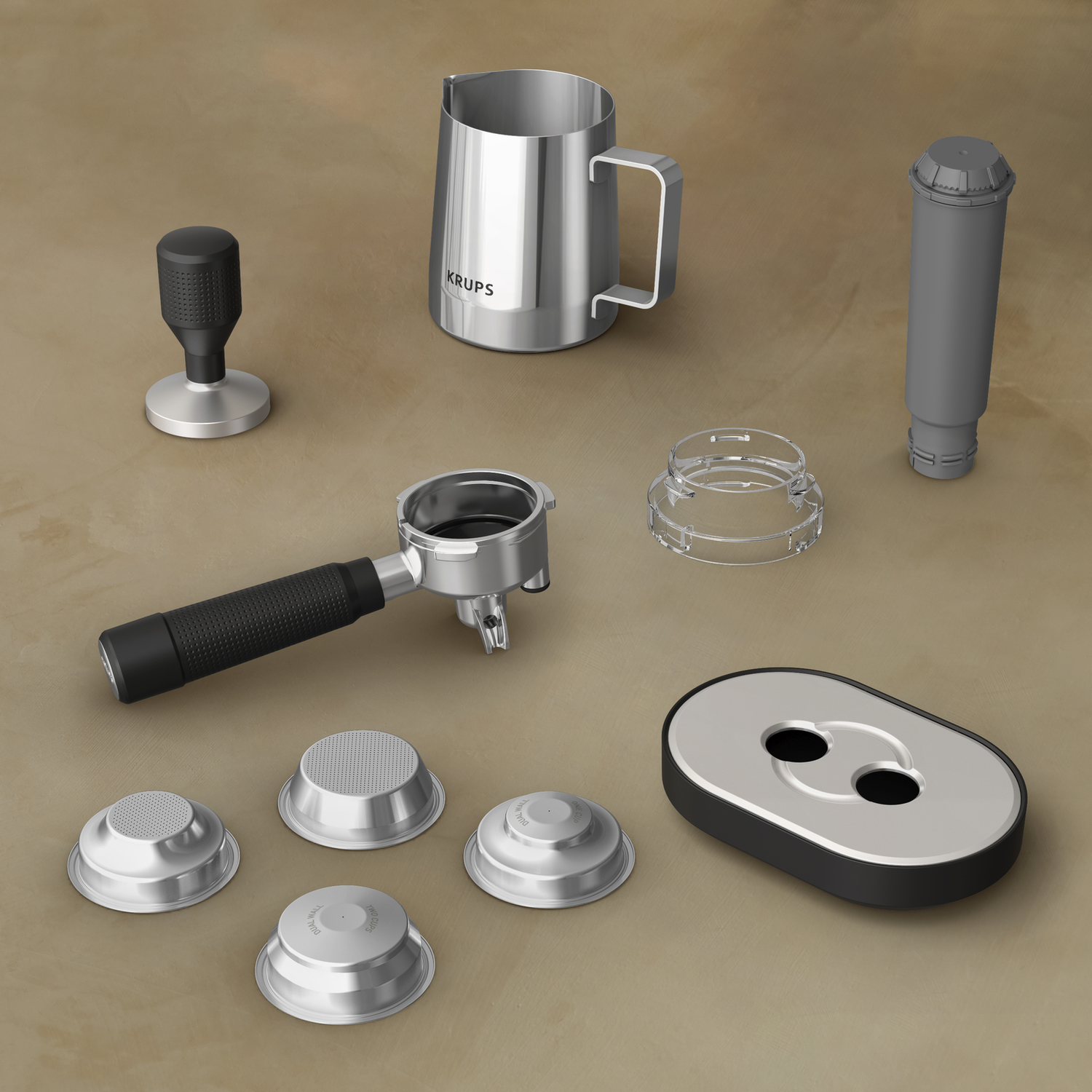Espresso machine components: a tamper, milk pitcher, portafilter, filter baskets, and more.