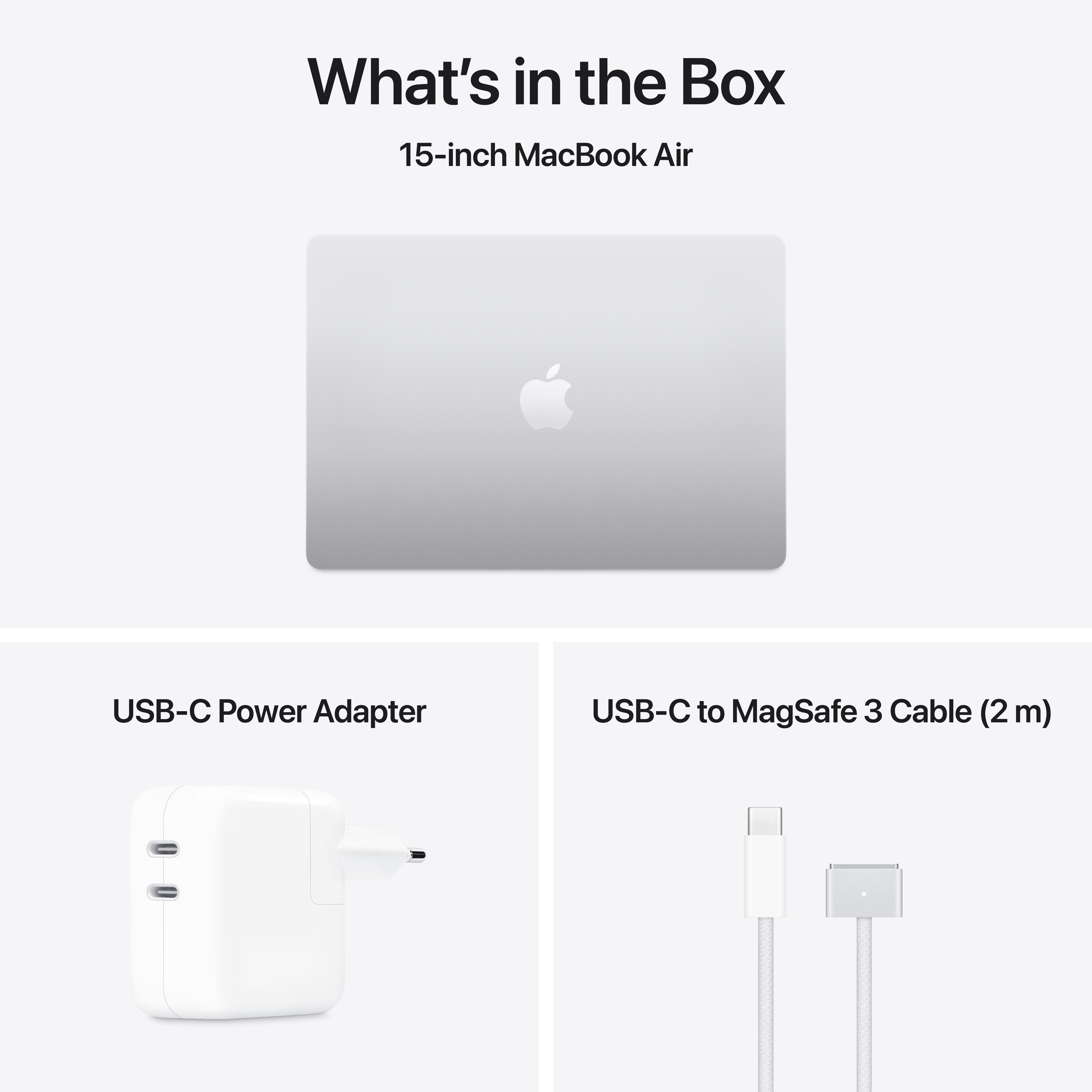 MacBook Air avec chargeur et câble, affiché sur une surface blanche.