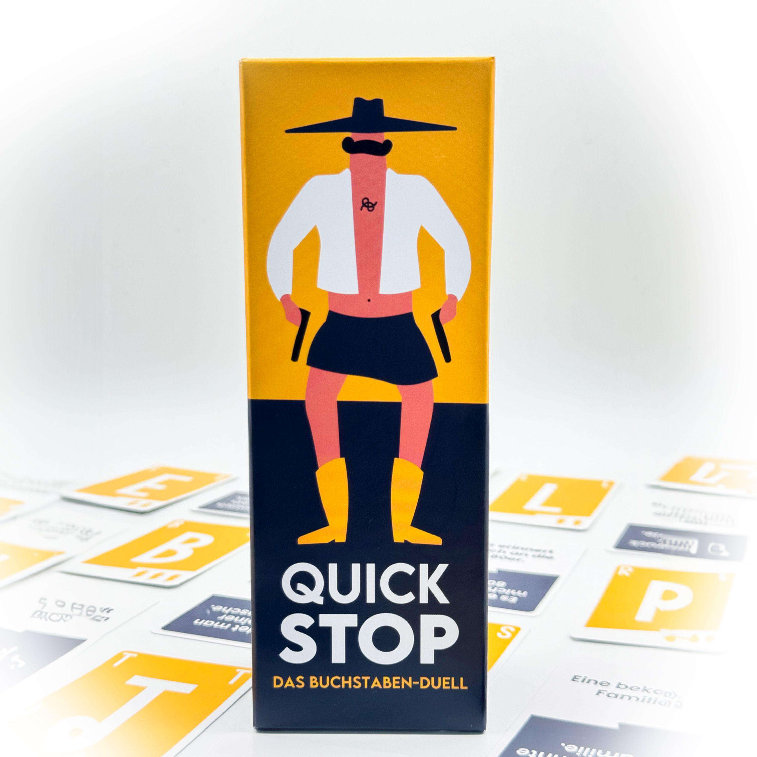 Box mit dem Brettspiel 'Quick Stop'. Die Box zeigt einen Comic-Mann mit Pistolen.