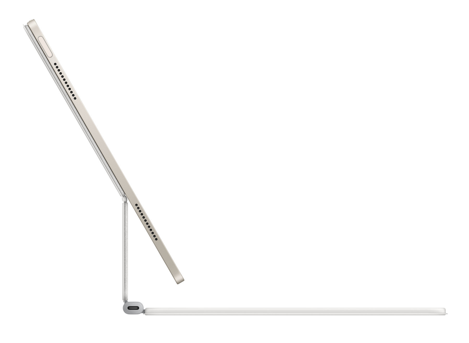 Widok z boku srebrnego tabletu z dołączoną osłoną klawiatury, lekko pochylony.