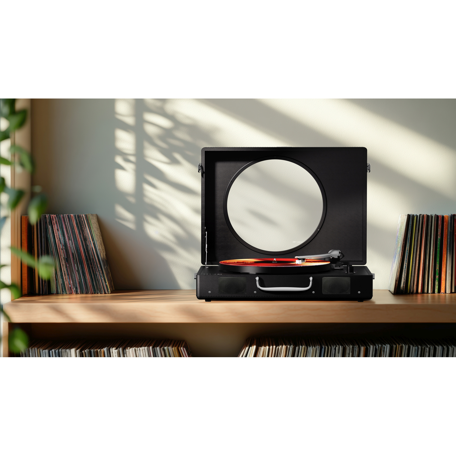 Black record player with red vinyl and mirror, flanked by stacks of records.