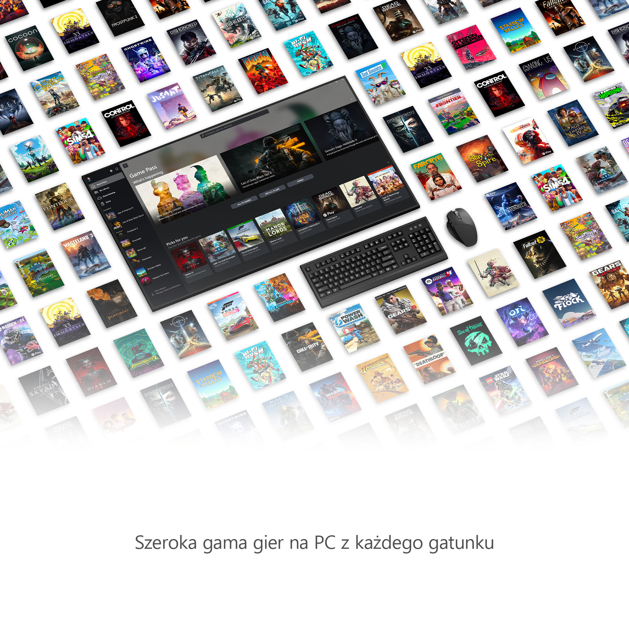 Okładki gier PC, klawiatura, mysz i monitor.