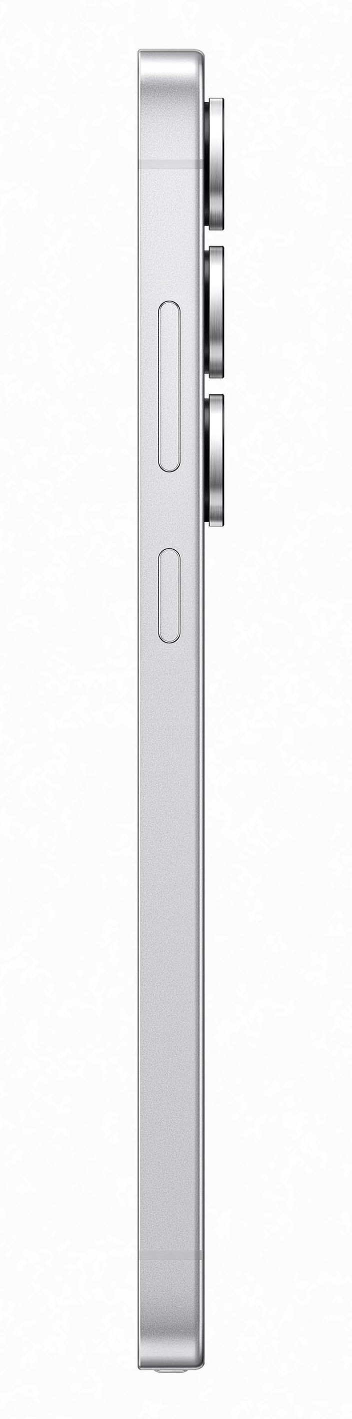 Widok z boku srebrnego telefonu z aparatami. Widoczne trzy obiektywy. Białe tło.