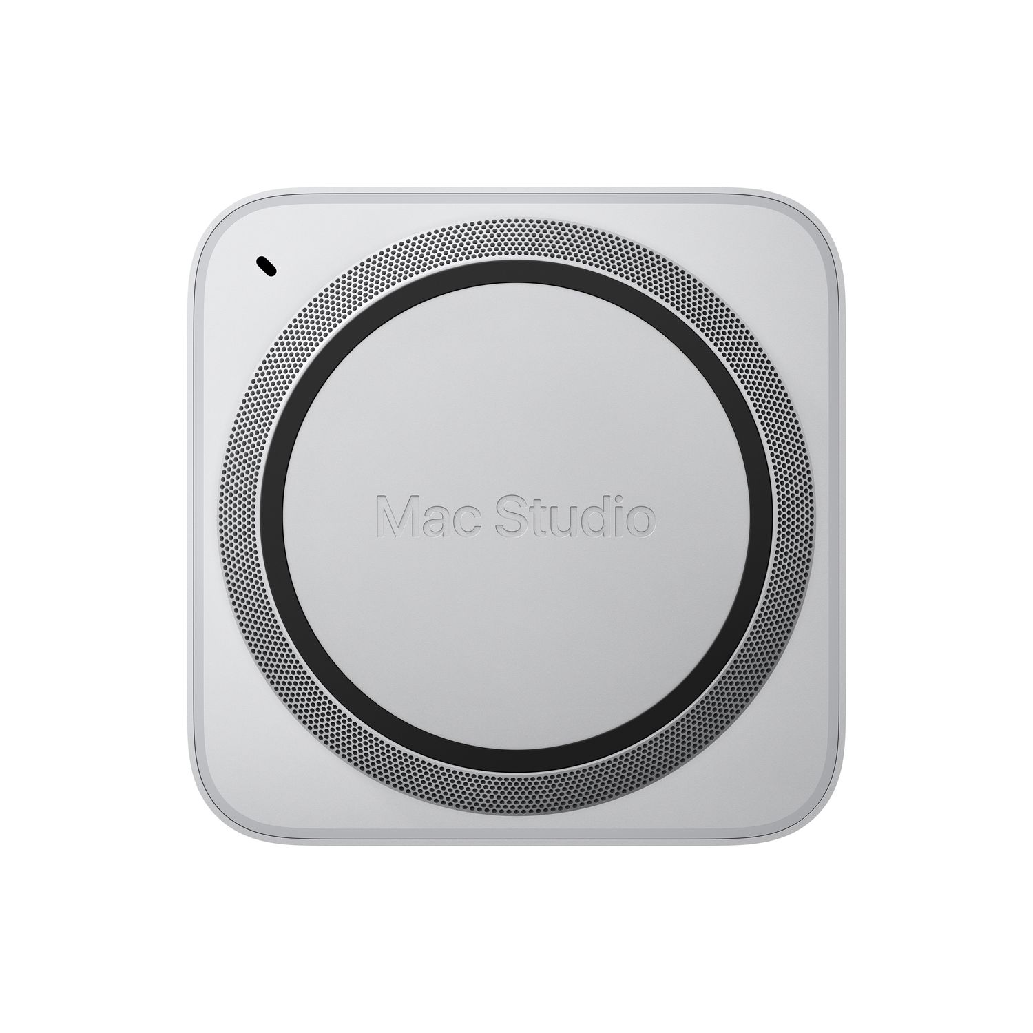 White Mac Studio device. The top surface has a circular design with a dot.